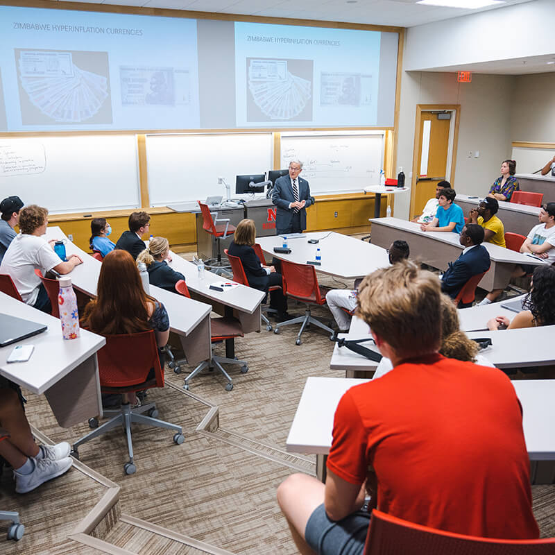 Students listen to professor lecture.